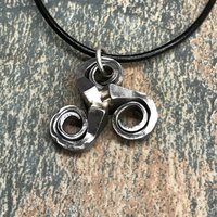 horseshoe nail triskelion necklace