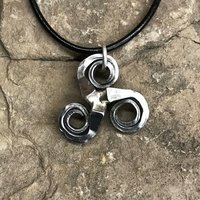 horseshoe nail triskelion necklace