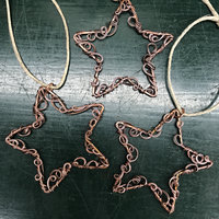 copper lacy star ornament, examples