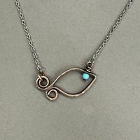 Copper fish necklace.