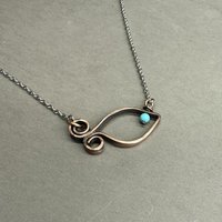 Copper fish necklace.