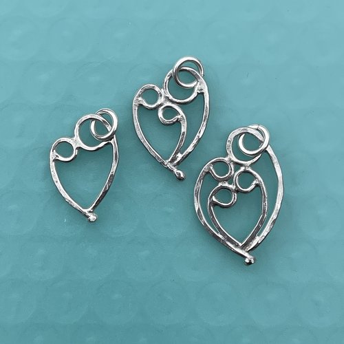 Mother & 1, 2, or 3 child pendant, sterling silver.