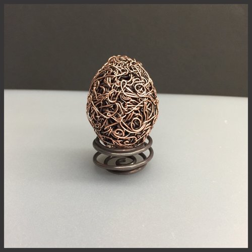 woven copper egg