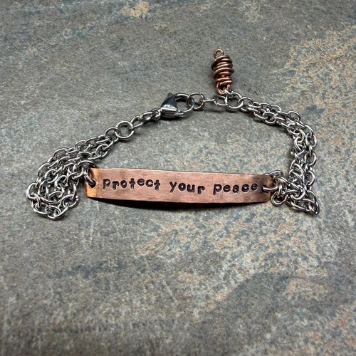 Protect Your Peace mixed metal bracelet, front view.