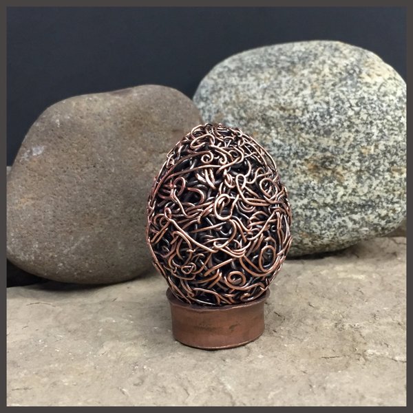 woven copper egg