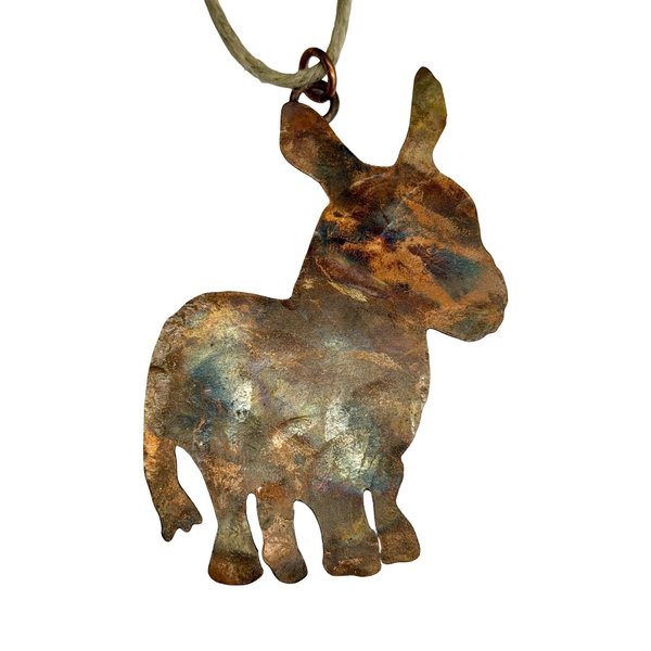 Copper donkey silhouette ornament on white background. 