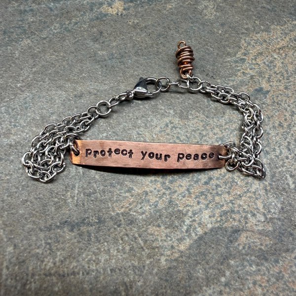 Protect Your Peace mixed metal bracelet, front view.
