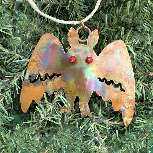 mothman copper ornament, flame patina, red glass bead eyes
